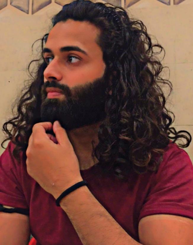 curly hair man with beard